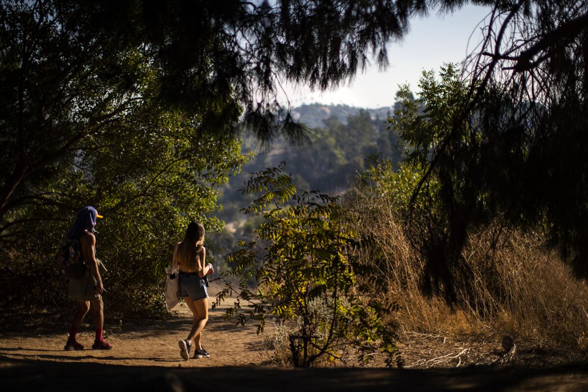 Hikers leave Peanut Lake.