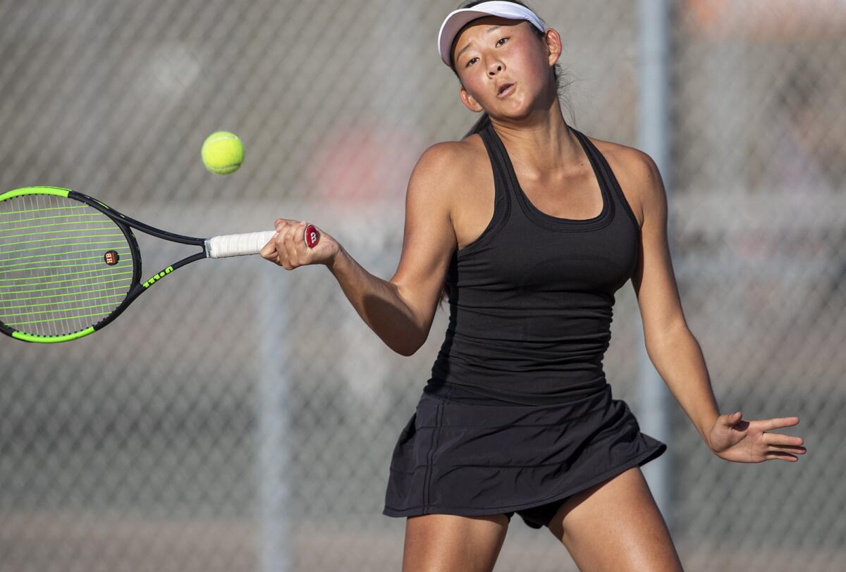 Huntington Beach's Solaya Han, pictured returning a shot against Edison on Oct. 24, led the Oilers to a 16-2 win over Oaks Christian in the first round of the CIF Southern Section Division 1 playoffs on Wednesday.