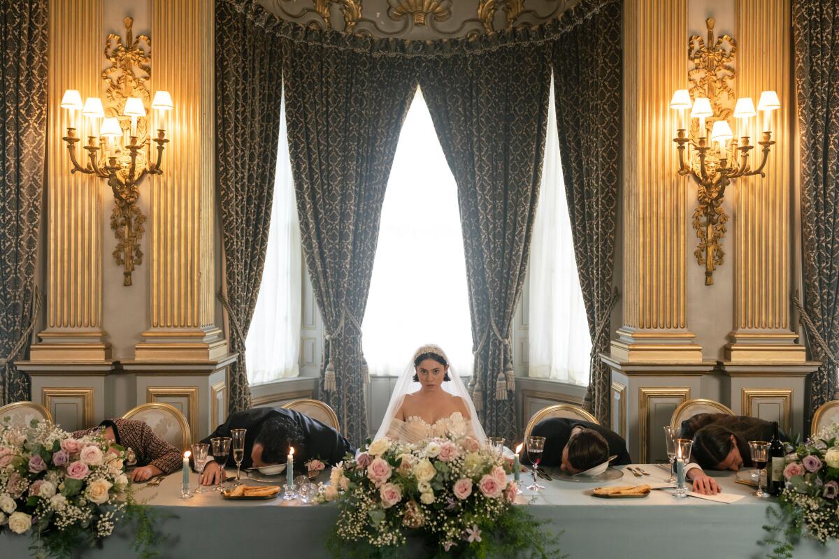 A bride at her wedding reception surrounded by dead guests