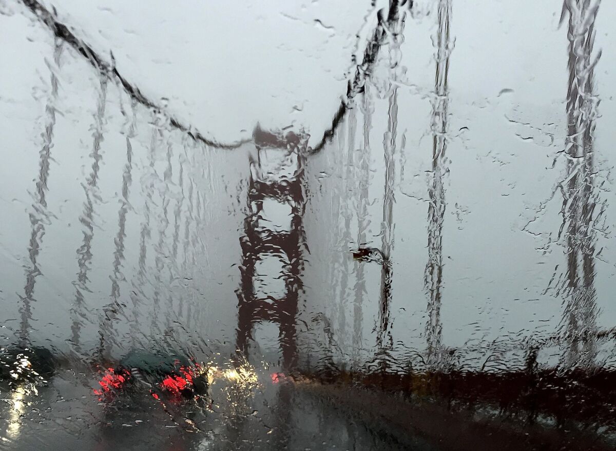 San Francisco's Golden Gate Bridge is seen through a rain-covered windshield in December 2016. An atmospheric river-fueled storm is expected to hit the Bay Area starting Wednesday.