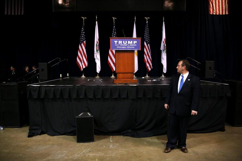 The podium is empty after a rally for Republican presidential candidate Donald Trump was canceled at the UIC Pavilion on March 11, 2016, in Chicago.