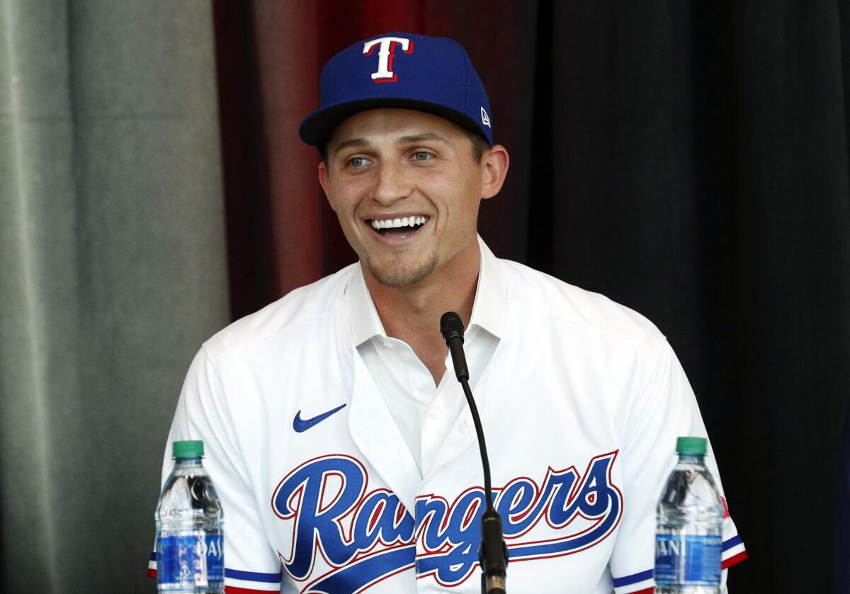 New Texas Rangers infielder Corey Seager speaks at a press conference.