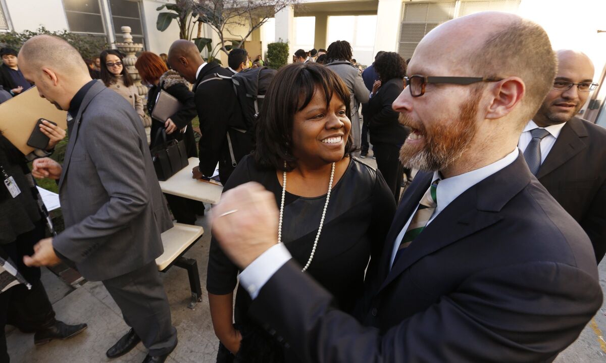 Dixon Slingerland, right, was fired last month as the top executive of Youth Policy Institute.