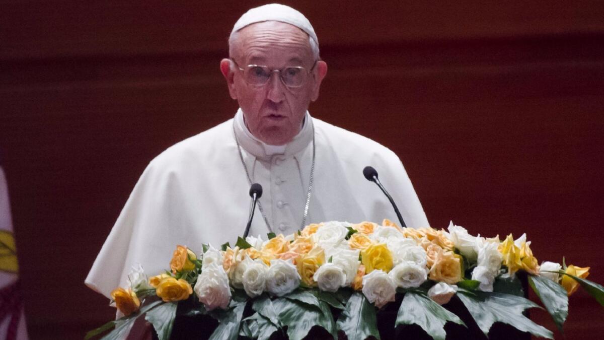 Pope Francis speaks during an event in Myanmar capital Naypyidaw on Tuesday.