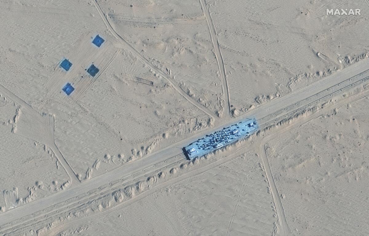 Satellite image of a building on rail tracks in China