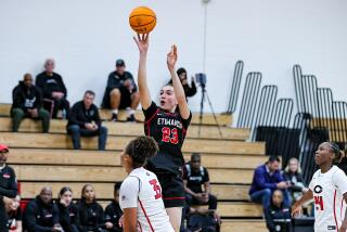 Etiwanda's Grace Knox goes up for a shot against Corona Centennial in Wednesday's season-opening win.