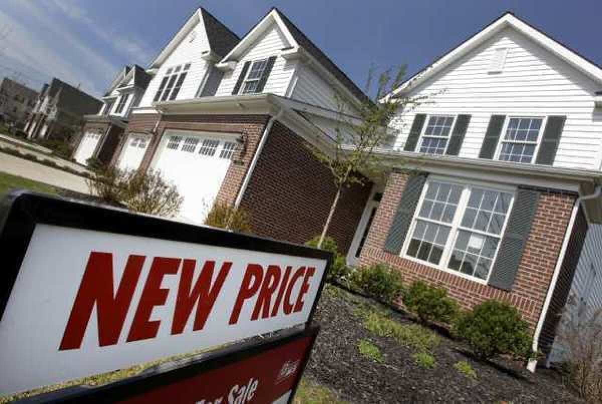 Newly constructed homes for sale. The Commerce Department says new-home sales fell 1.6%.