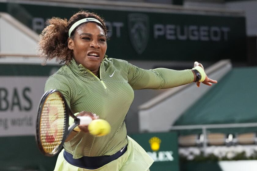 United States Serena Williams plays a return to Romania's Irina-Camelia Begu during their first round match.