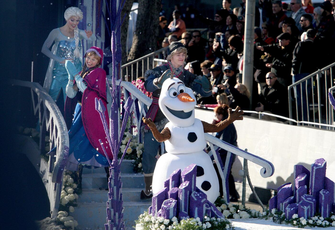 The Disneyland Resort float rolls down Orange Grove Avenue during the 2016 Rose Parade in Pasadena on Friday, Jan. 1, 2016. The three-part float included a section for Frozen, a section for Disneyland Resort and a section for Star Wars.