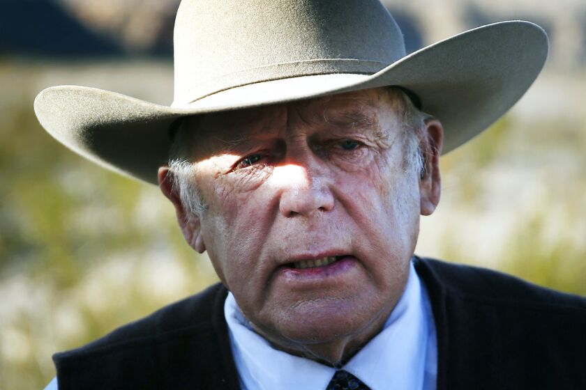 Rancher Cliven Bundy speaks to the media near his ranch in Bunkerville, Nev., on Jan. 27, 2016.