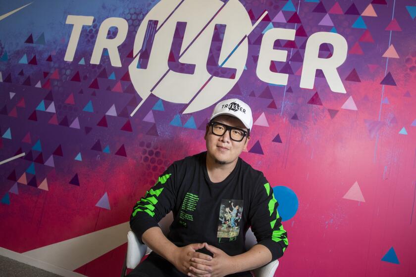 CENTURY CITY, CA - AUGUST 06: Triller CEO Mike Lu sits for a portrait in his officesThursday, Aug. 6, 2020 in Century City, CA. Triller launched a music video editing app in 2015, and has risen to prominence especially as TikTok is in danger of getting banned in the U.S. (Brian van der Brug / Los Angeles Times)