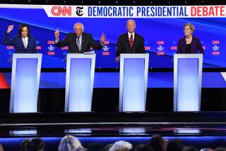 Democratic presidential hopefuls (from L) California Senator Kamala Harris, Vermont Senator Bernie Sanders, former US Vice President Joe Biden and Massachusetts Senator Elizabeth Warren take part in the fourth Democratic primary debate of the 2020 presidential campaign season co-hosted by The New York Times and CNN at Otterbein University in Westerville, Ohio on October 15, 2019. (Photo by SAUL LOEB / AFP) (Photo by SAUL LOEB/AFP via Getty Images)