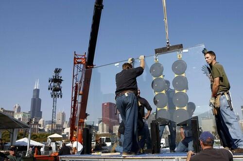 With the Sears Tower looming in the background, workers install bulletproof glass on the stage near the podium for Democratic presidential candidate Sen. Barack Obama, who will give his election-night speech here.