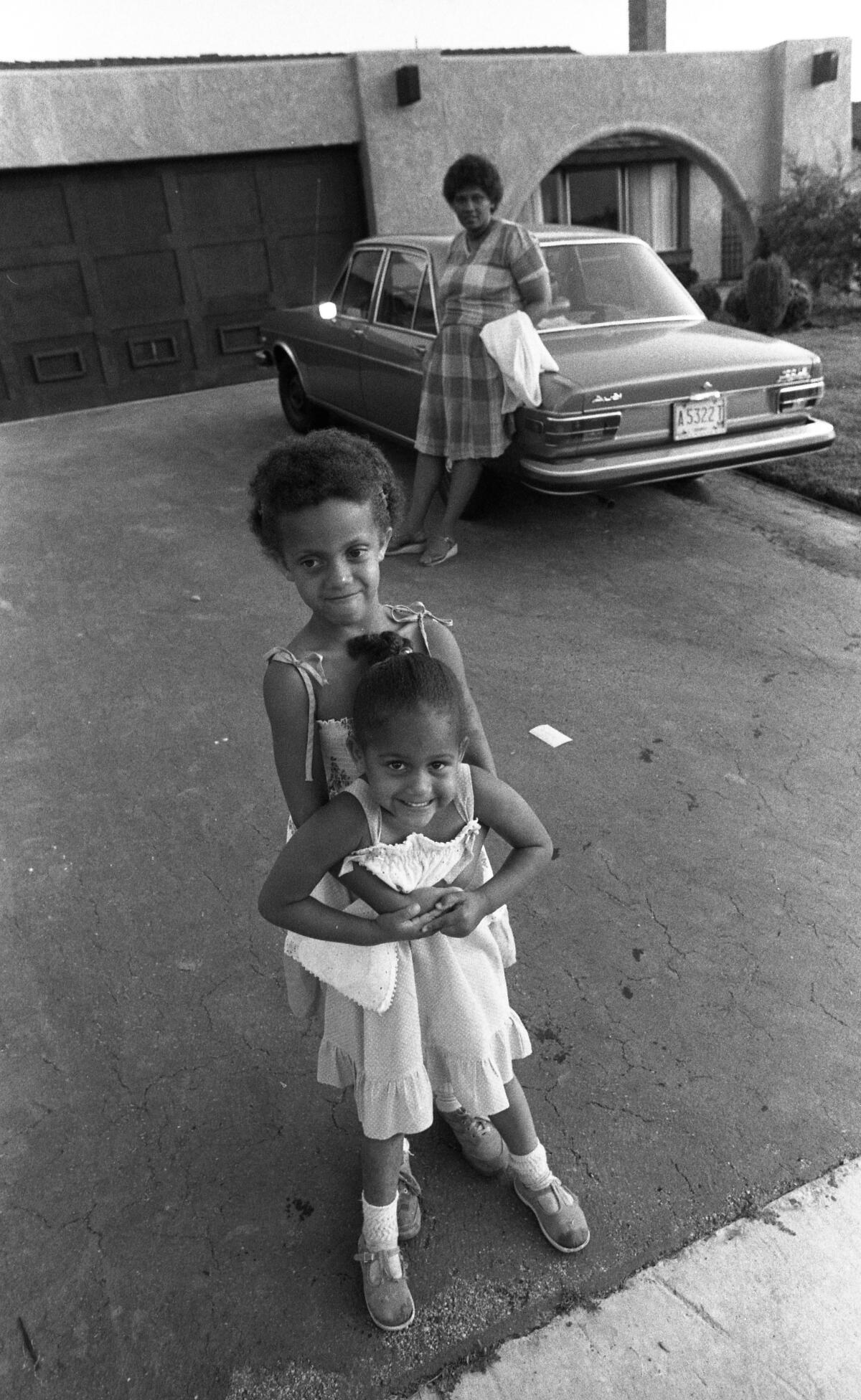 Darlene Lewis and her two daughters.