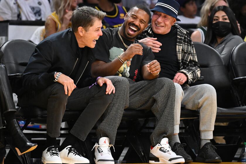 Los Angeles, CA - May 06: Michael B. Jordan, center watches game three between the Los Angeles Lakers and the Golden State Warriors at Crypto.com Arena on Saturday, May 6, 2023 in Los Angeles, CA. (Wally Skalij / Los Angeles Times)