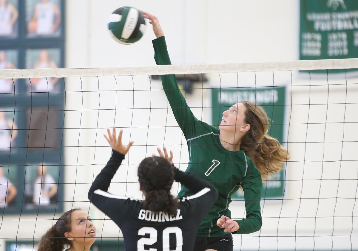 Costa Mesa's Lorelei Hobbis (1), shown making a kill against Godinez in 2019, had 21 kills in the Mustangs' victory.