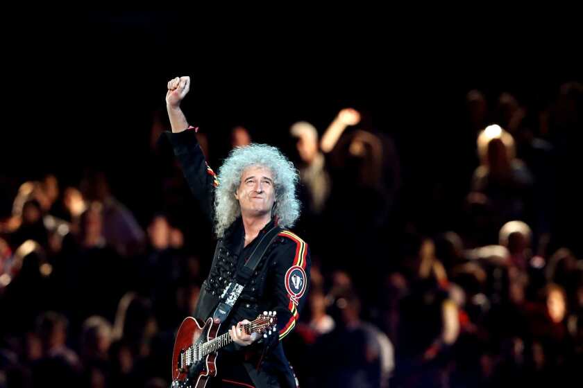 Brian May of Queen performs during the closing ceremony.