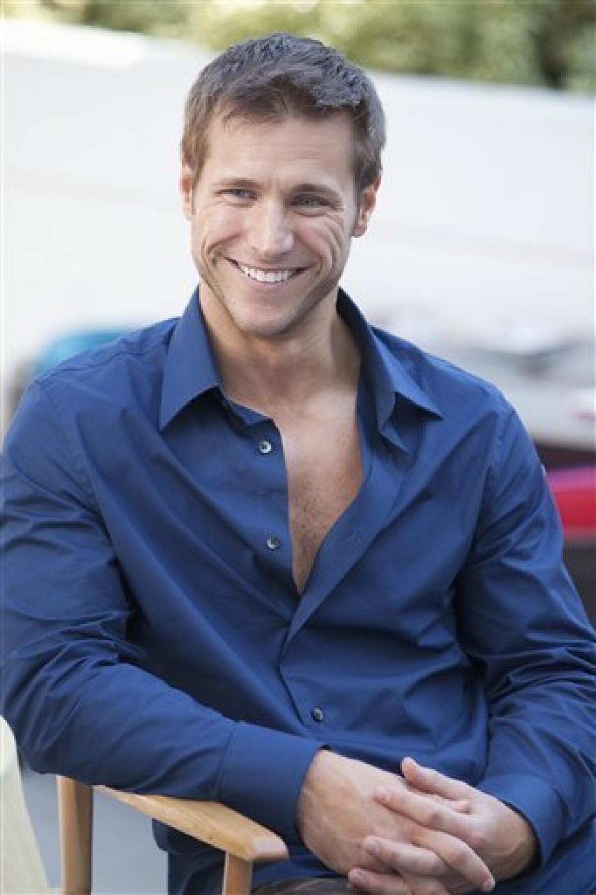In this undated publicity image released by ABC, bachelor Jake Pavelka,is shown during the filming of the romance reality series, "The Bachelor" . (AP Photo/ABC, Greg Zabilski)