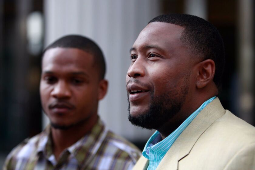 March 16, 2015_San Diego, California_USA_|San Diego-based rapper Brandon Duncan, right, and Aaron Harvey at press conference held Monday after charges were dismissed against them. |_Mandatory Photo Credit: Photo by Misael Virgen/UT San Diego/Copyright 2015 San Diego Union-Tribune, LLC