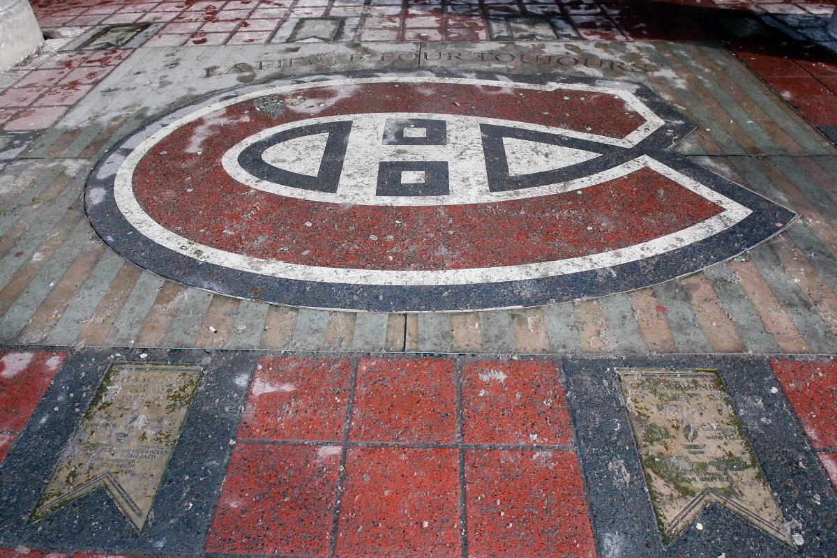 A sidewalk tribute to the Montreal Canadiens and their Stanley Cup wins located near the site of the old Montreal Forum in 2009.