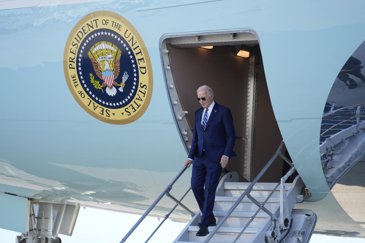 Biden arrives at John F. Kennedy International Airport in New York on Thursday.