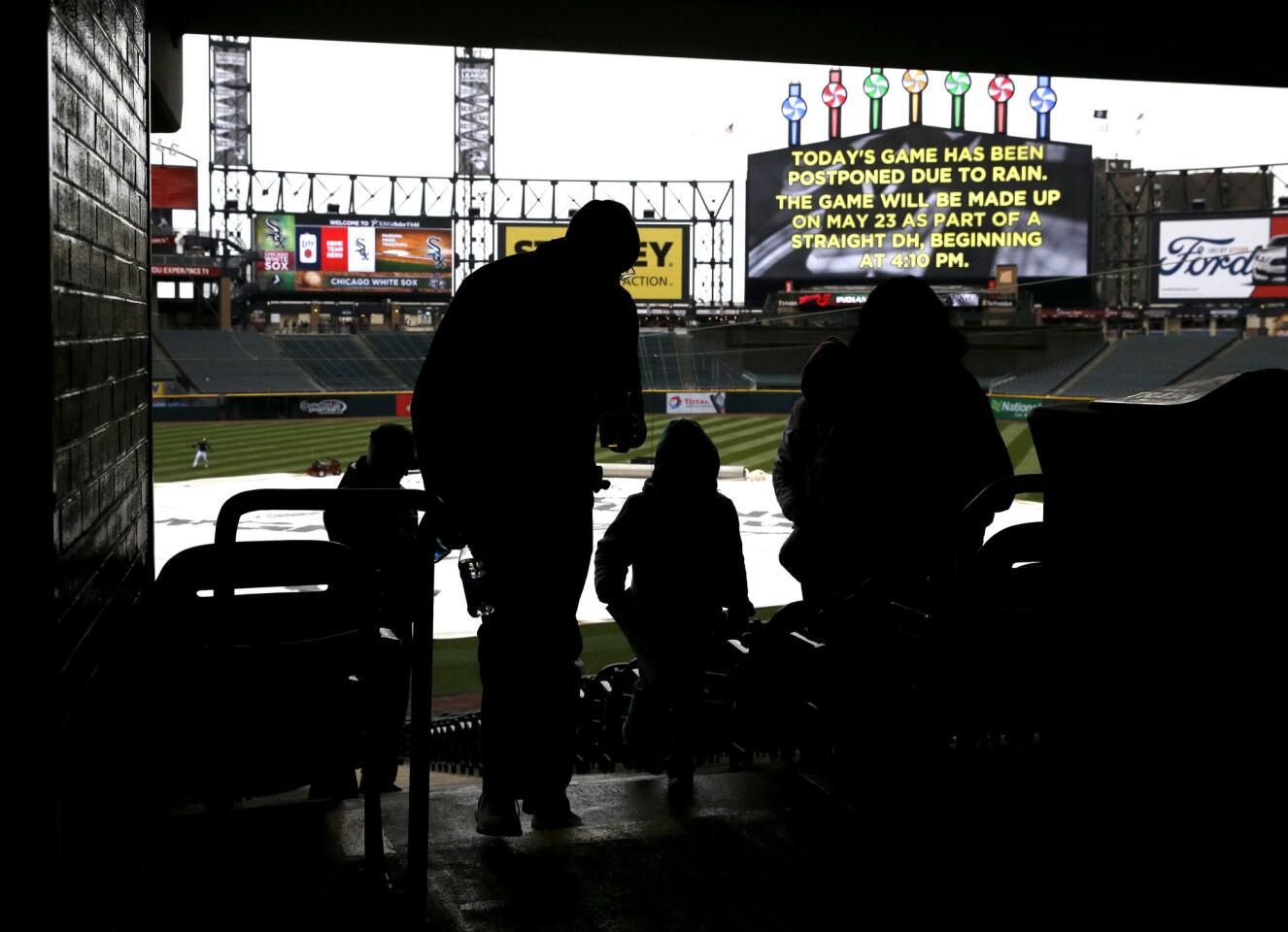 The new video board announces the postponement of a White Sox-Indians game at U.S. Cellular Field on April 10, 2016.