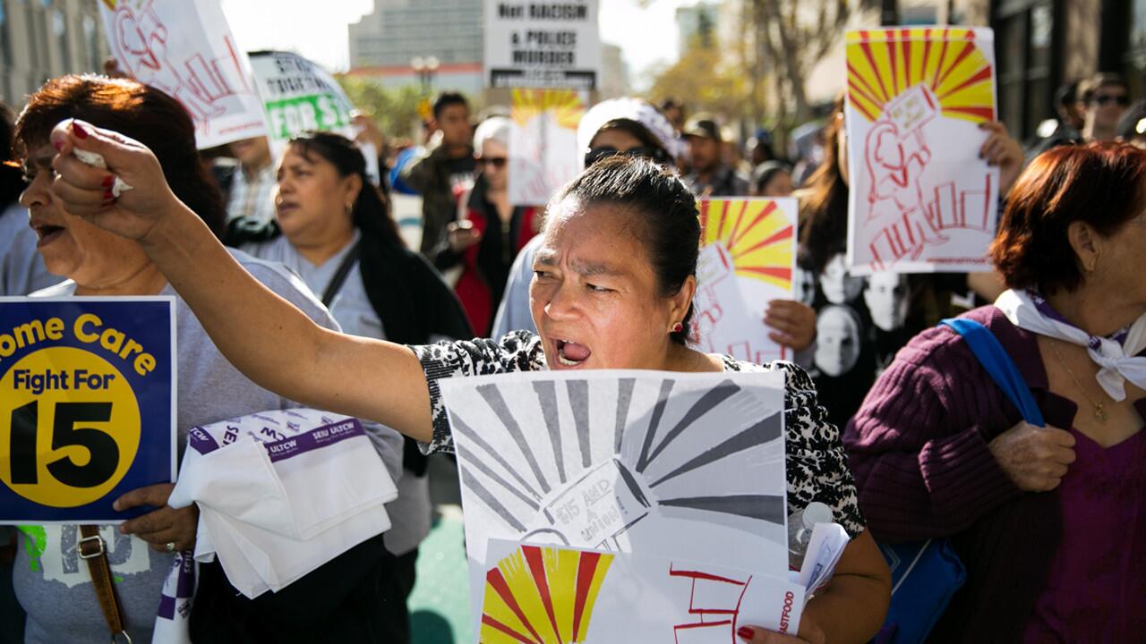 Fast-food workers and their supporters rallied in downtown Los Angeles on Thursday as part of a wave of protests planned in 160 cities around the nation advocating for $15-an-hour pay.
