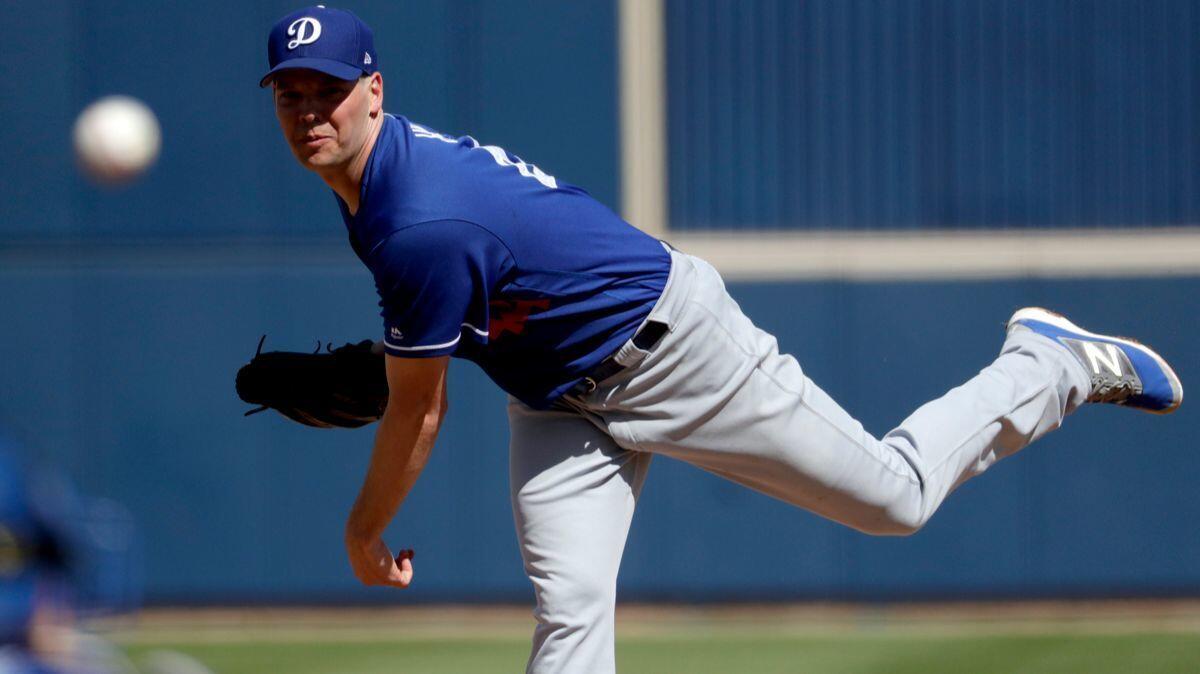 Rich Hill of the Dodgers, shown during an earlier spring-training game, threw against Milwaukee Brewers minor leaguers Sunday.