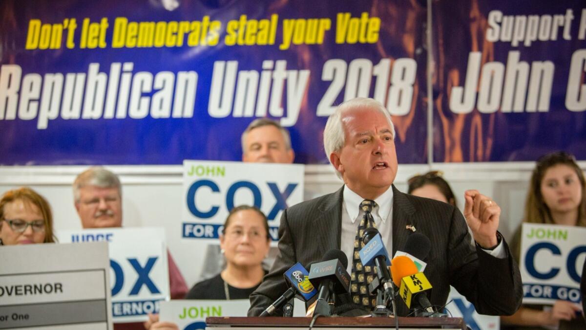 Rancho Santa Fe businessman John Cox has President Trump's endorsement for California governor. Above, the Republican candidate speaks at a May event in Fresno.