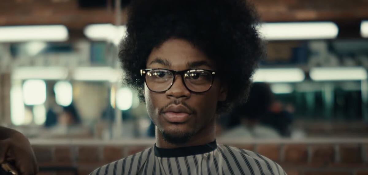 A scene from the ad "The Barbershop."