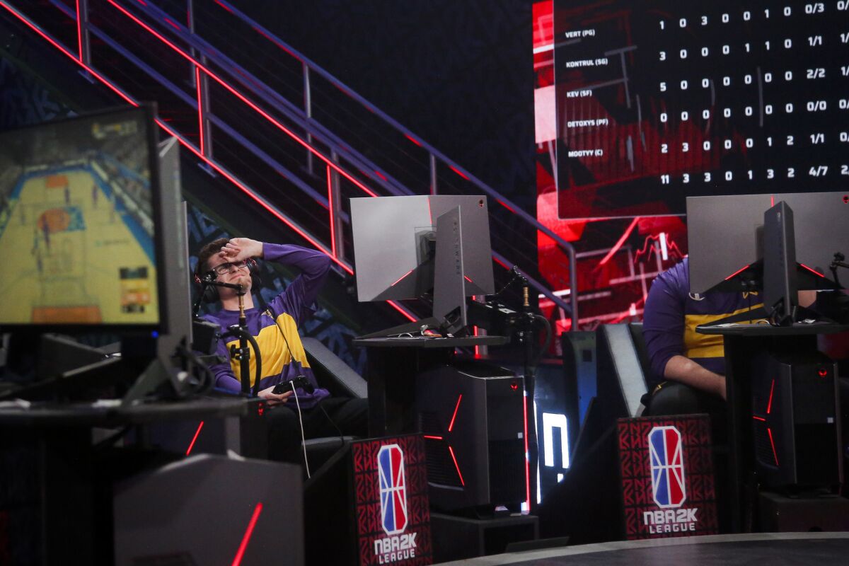 Lakers Gaming shooting guard Christopher Cantrell reacts to a shot scored by Knicks Gaming during the game in the NBA 2K League Studio on June 5.