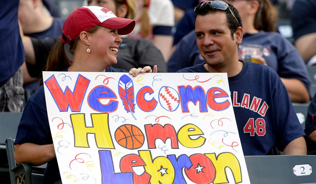 Cleveland Indians fans show their support for LeBron James and his return to the Cavaliers during a game Friday night against the Chicago White Sox.