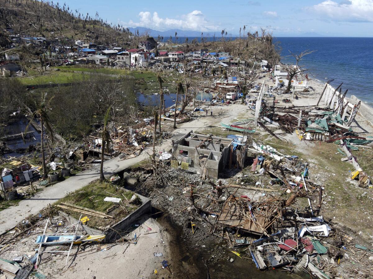 A view of destroyed buildings by the sea 