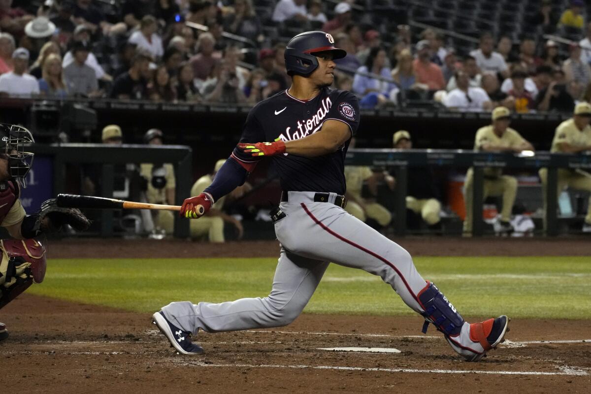 Juan Soto bats against the Arizona Diamondbacks in July