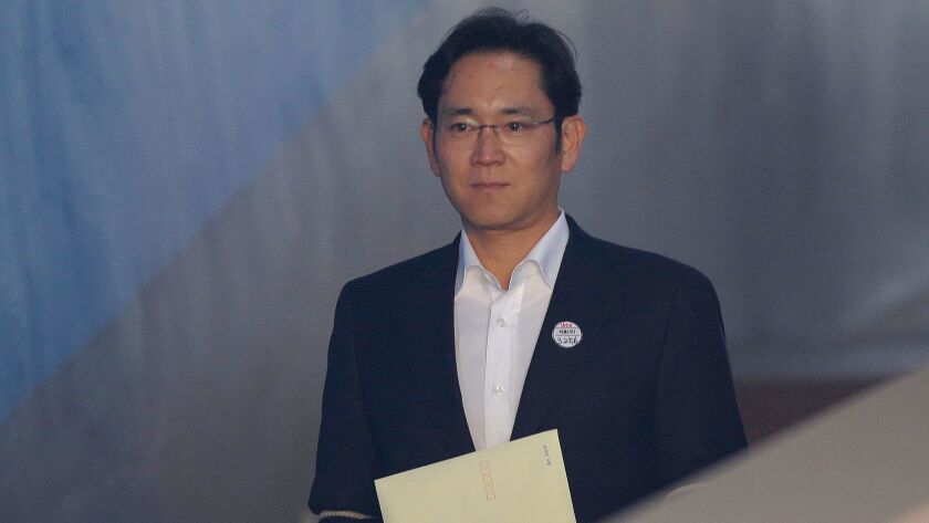 Lee Jae-yong arrives at the Seoul High Court for a hearing on Feb. 5.
