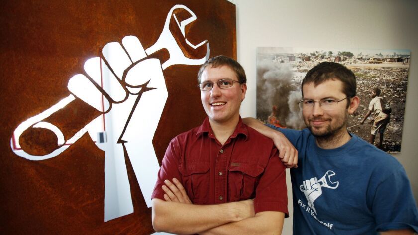Kyle Wiens, left, and Luke Soules co-founded IFixit, which teaches the public how to repair electronics and other items.