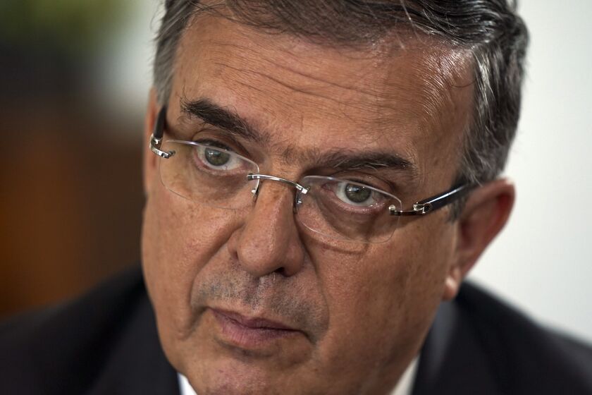 FILE - Mexican Foreign Minter Marcelo Ebrard listens to a question during an interview at his office in Mexico City, Monday, April 3, 2023. Ebrard announced on Tuesday, June 6, 20023 that he intends to resign as Foreign Minister as he tests the waters to run for President of Mexico in 2024. (AP Photo/Fernando Llano, File)