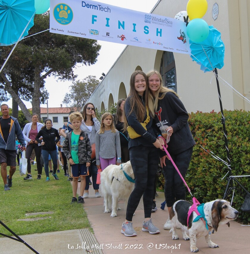 The inaugural "La Jolla Mutt Strut" drew about 100 dogs and their owners to The Village on May 7.