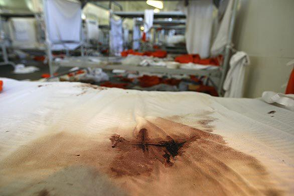Bloodstained mattress underscores violence of riot, in which 175 inmates were injured.