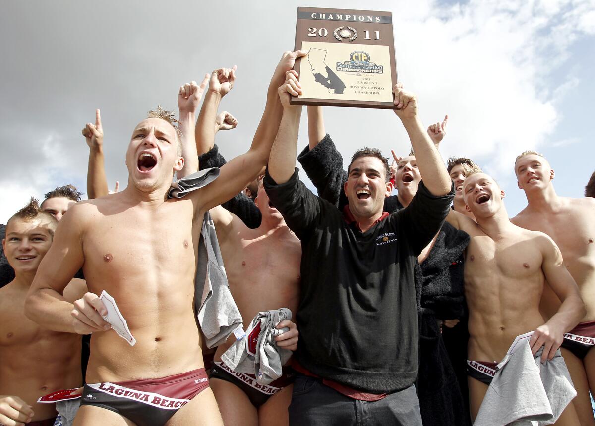 Laguna Beach boys' water polo head coach Ethan Damato celebrates after winning the Division 3 title in 2011.