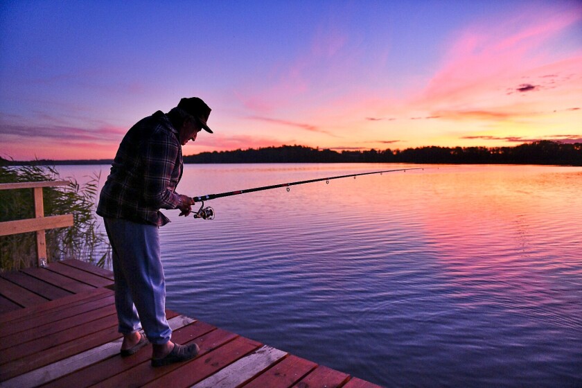 Edward "Eddie B" Borysewicz fishing at his lake 比特币交易网home in Poland.