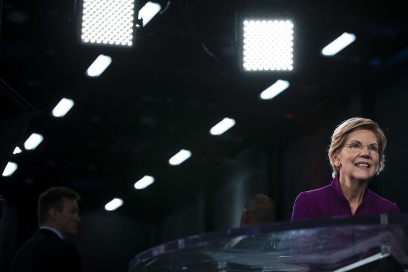 MIAMI, FLORIDA - JUNE 26: Sen. Elizabeth Warren (D-MA) speaks in the media in the spin room following the first night of the Democratic presidential debate on June 26, 2019 in Miami, Florida. A field of 20 Democratic presidential candidates was split into two groups of 10 for the first debate of the 2020 election, taking place over two nights at Knight Concert Hall of the Adrienne Arsht Center for the Performing Arts of Miami-Dade County, hosted by NBC News, MSNBC, and Telemundo. (Photo by Drew Angerer/Getty Images) ** OUTS - ELSENT, FPG, CM - OUTS * NM, PH, VA if sourced by CT, LA or MoD **