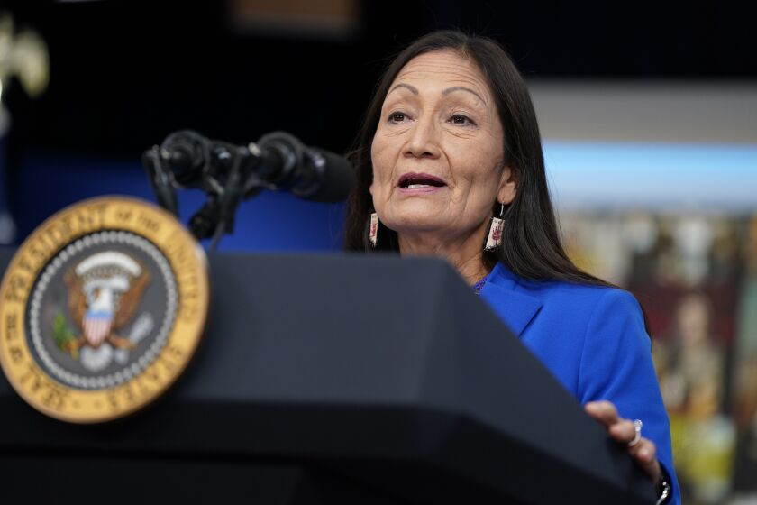 FILE - Interior Secretary Deb Haaland speaks during a Tribal Nations Summit during Native American Heritage Month, in the South Court Auditorium on the White House campus, on Nov. 15, 2021, in Washington. Secretary Haaland on Friday, Nov. 19, 2021, declared "squaw" to be a derogatory term and said she is taking steps to remove the term from federal government use and to replace other derogatory place names. (AP Photo/Evan Vucci, File)