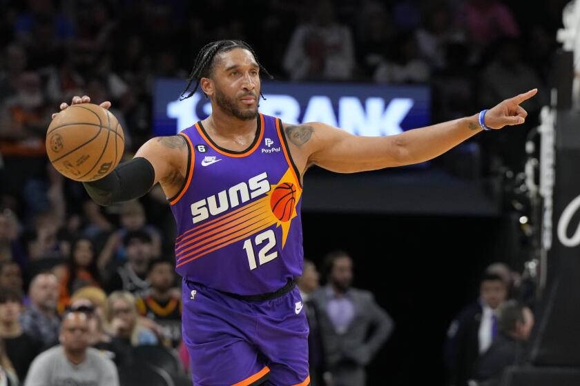 Phoenix Suns forward Ish Wainright (12) during the first half of an NBA basketball game against the LA Clippers, Sunday, April 9, 2023, in Phoenix. (AP Photo/Rick Scuteri)
