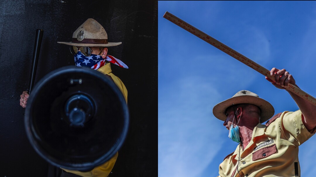 Randy Order backstage, left. Order carries a yardstick and threatens to expel fans who are not properly socially distanced.