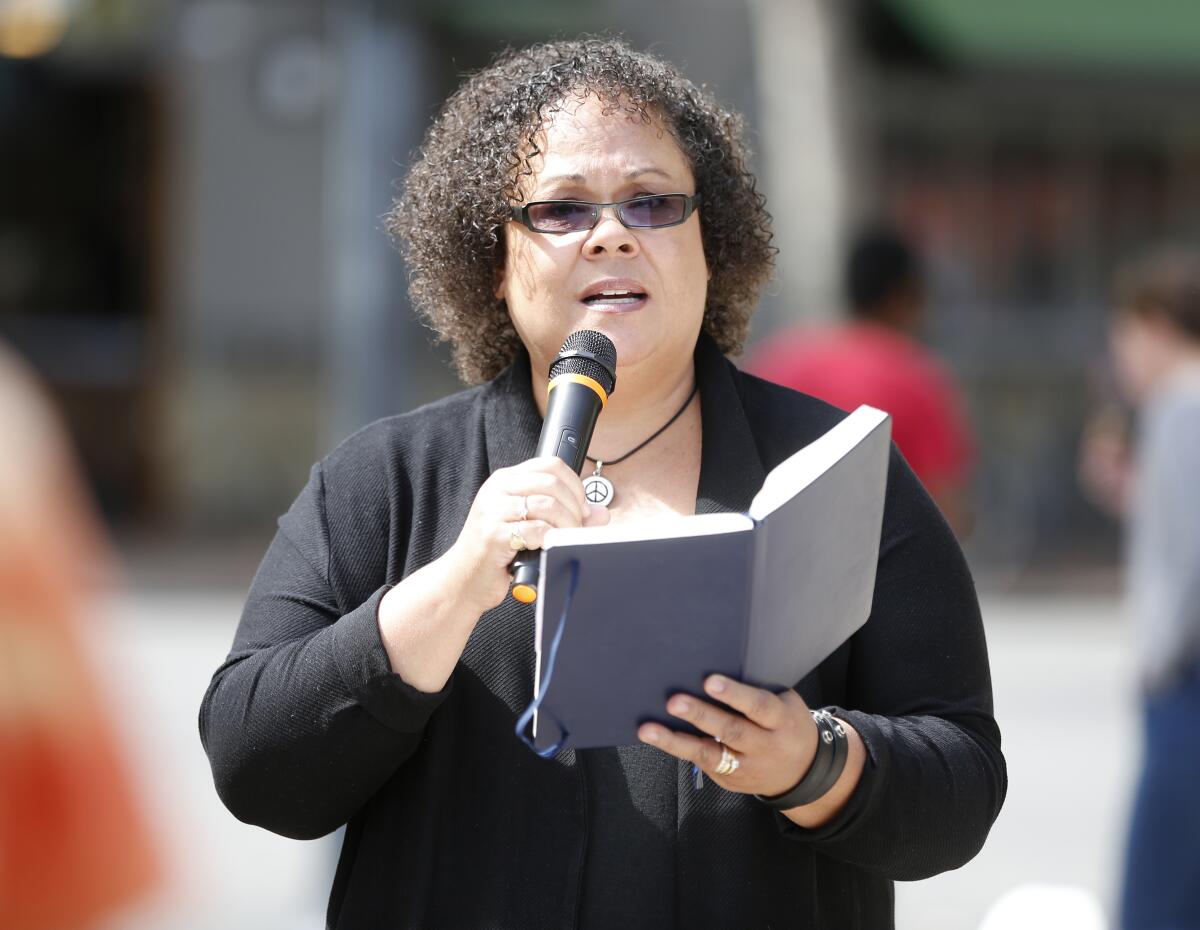 Julie Lythcott-Haims speaks in downtown Palo Alto in 2018. 