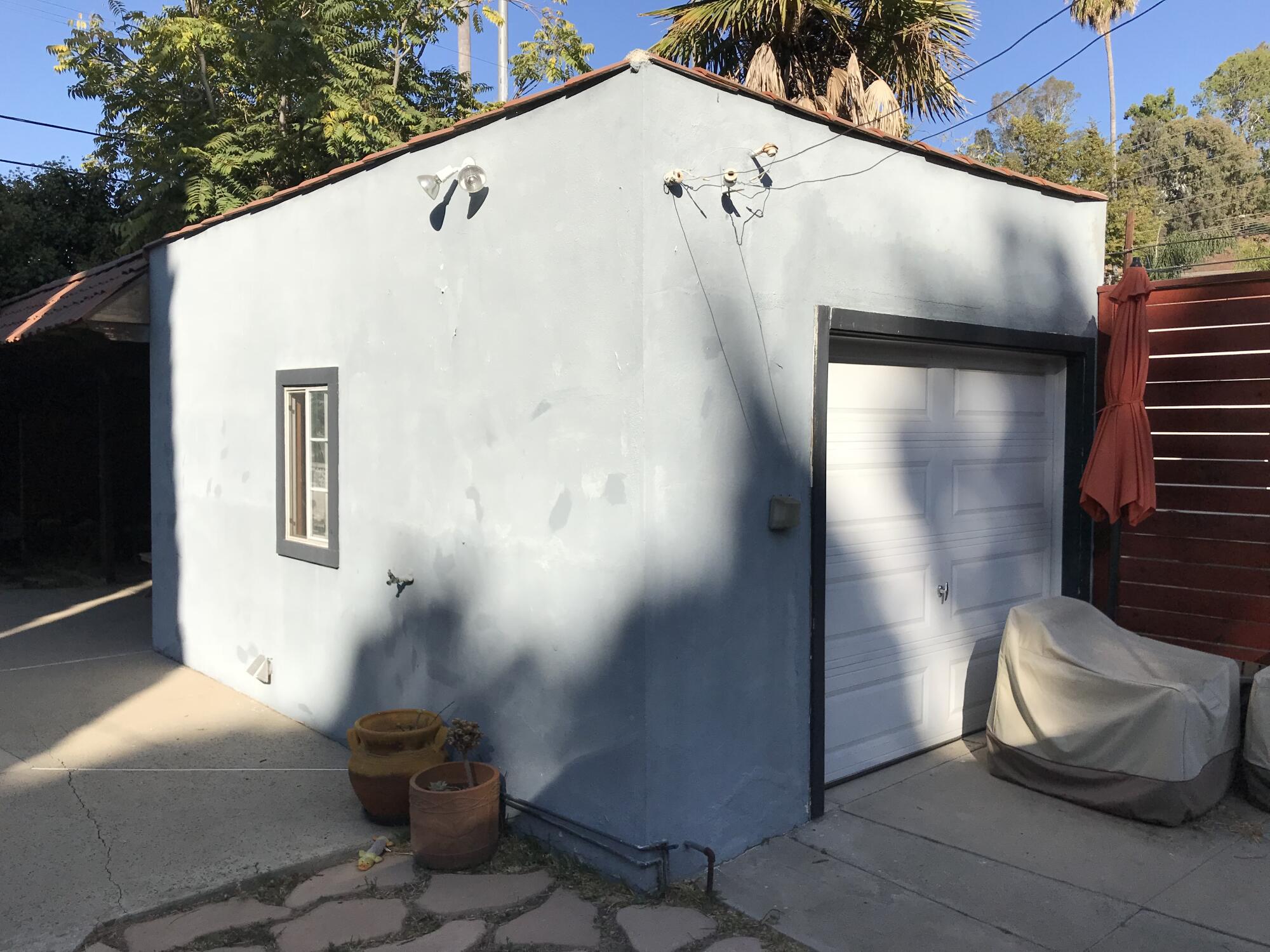 A one-car garage before being converted into an ADU.