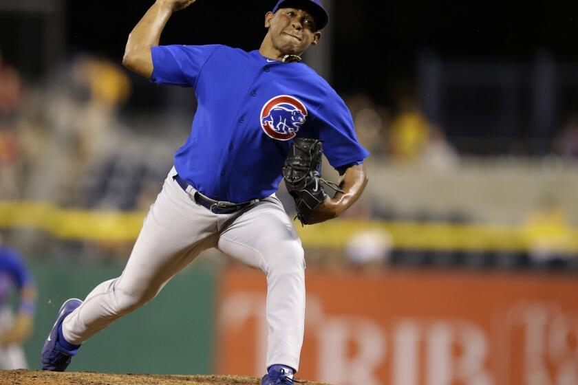 The Dodgers received closer Carlos Marmol, cash and cap space from the Chicago Cubs in exchange for Matt Guerrier.