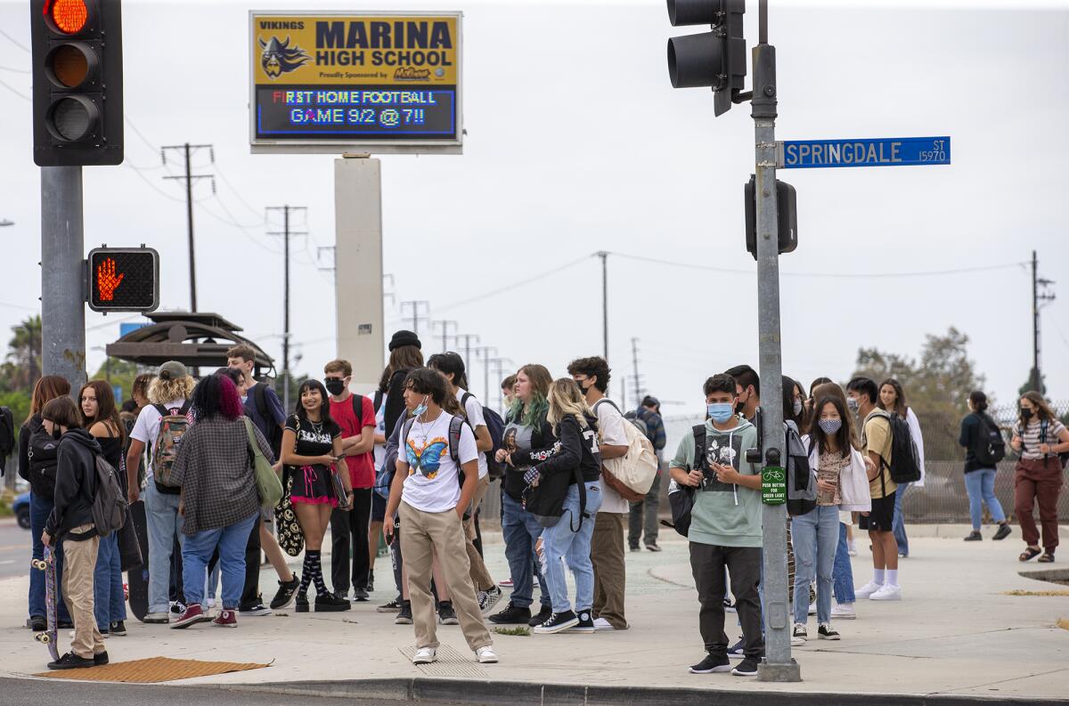Marina High School students leave the campus on Wednesday after the first day of school.