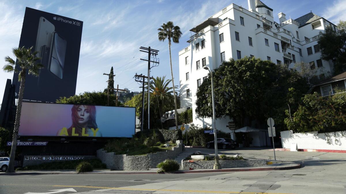 The singer from “A Star Is Born,” as played by Lady Gaga, is on a massive billboard in front of the Chateau Marmont. Songs from the film are nominated for a Grammy Award.